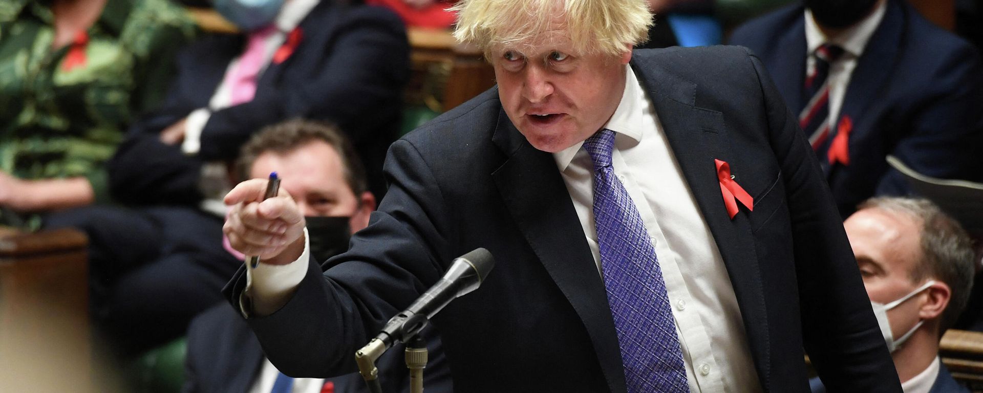 A handout photograph released by the UK Parliament shows Britain's Prime Minister Boris Johnson gesturing as he speaks during Prime Minister's Questions (PMQs) in the House of Commons in London on December 1, 2021 A handout photograph released by the UK Parliament shows Britain's Prime Minister Boris Johnson gesturing as he speaks during Prime Minister's Questions (PMQs) in the House of Commons in London on December 1, 2021 - Sputnik International, 1920, 12.01.2022