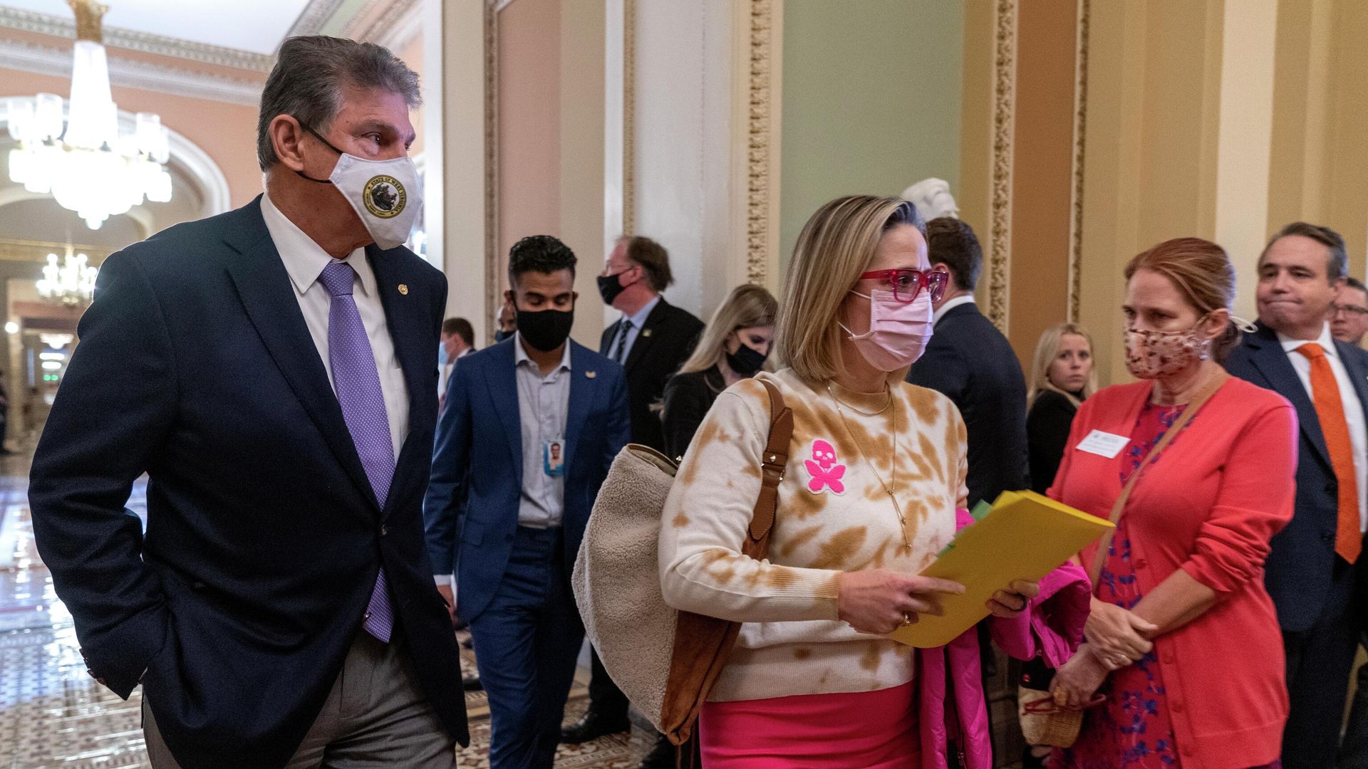 Sen. Joe Manchin, D-W.Va., left, walks with Sen. Kyrsten Sinema, D-Ariz., after attending a Democratic policy luncheon, Tuesday, Nov. 16, 2021, on Capitol Hill in Washington. Sen. Joe Manchin, D-W.Va., left, walks with Sen. Kyrsten Sinema, D-Ariz., after attending a Democratic policy luncheon, Tuesday, Nov. 16, 2021, on Capitol Hill in Washington. - Sputnik International, 1920, 16.12.2021