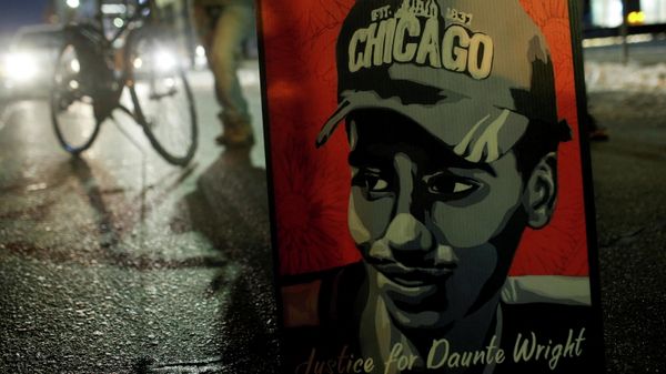 A poster of Daunte Wright is seen during a demonstration about the manslaughter trial of Kimberly Potter, a white former Minnesota police officer charged in the fatal shooting of Daunte Wright, a Black man, whose April death sparked protests, in Minneapolis, Minnesota, U.S. December 8, 2021. - Sputnik International