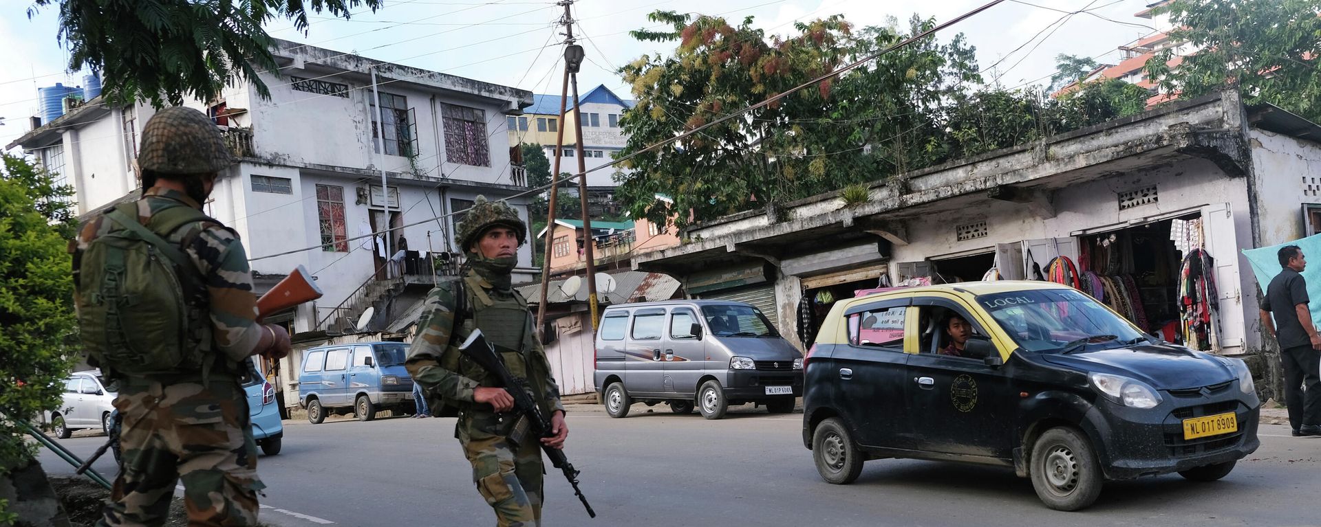 Soldiers stand guard on a street in Kohima, capital of the northeastern Indian state of Nagaland, Tuesday, Oct. 29, 2019 Soldiers stand guard on a street in Kohima, capital of the northeastern Indian state of Nagaland, Tuesday, Oct. 29, 2019 - Sputnik International, 1920, 21.12.2021