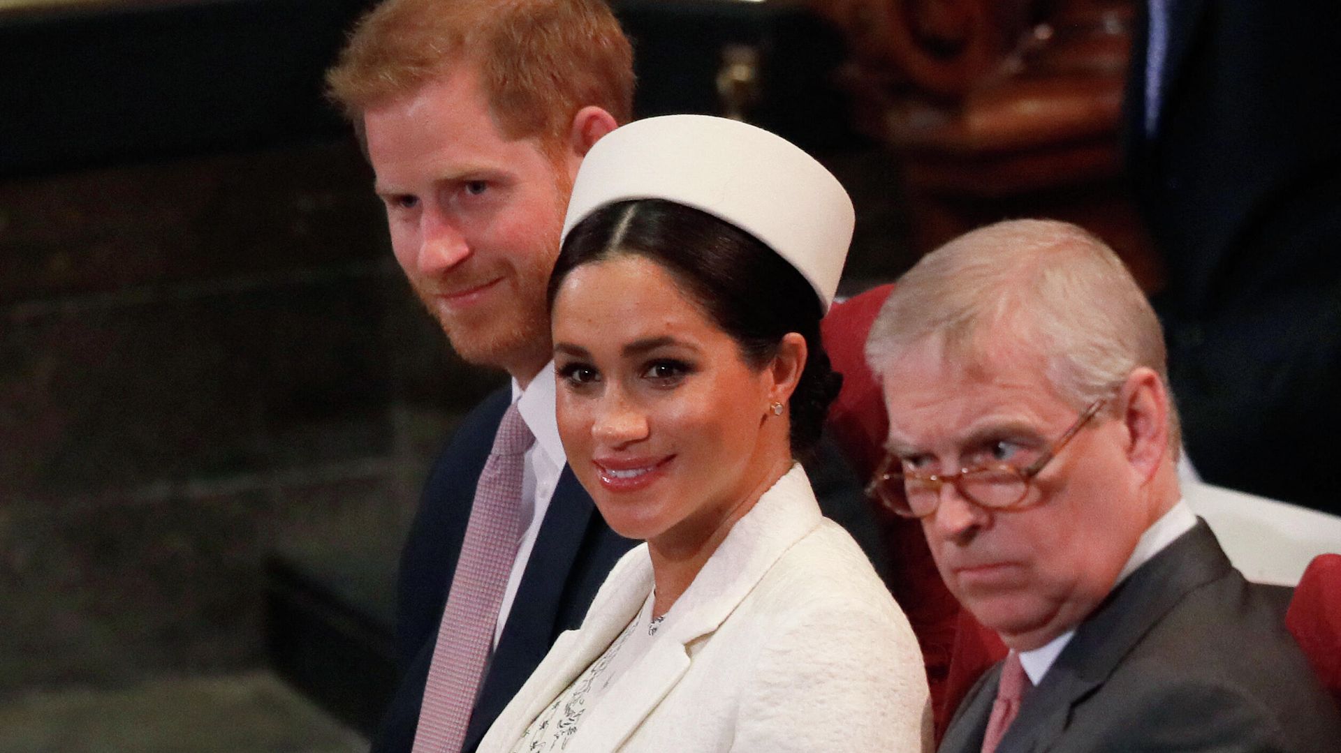 (L-R) Britain's Prince Harry, Duke of Sussex, Britain's Meghan, Duchess of Sussex and Britain's Prince Andrew, Duke of York, are seated as they attend the Commonwealth Day service at Westminster Abbey in London on March 11, 2019 (L-R) Britain's Prince Harry, Duke of Sussex, Britain's Meghan, Duchess of Sussex and Britain's Prince Andrew, Duke of York, are seated as they attend the Commonwealth Day service at Westminster Abbey in London on March 11, 2019 - Sputnik International, 1920, 22.12.2021