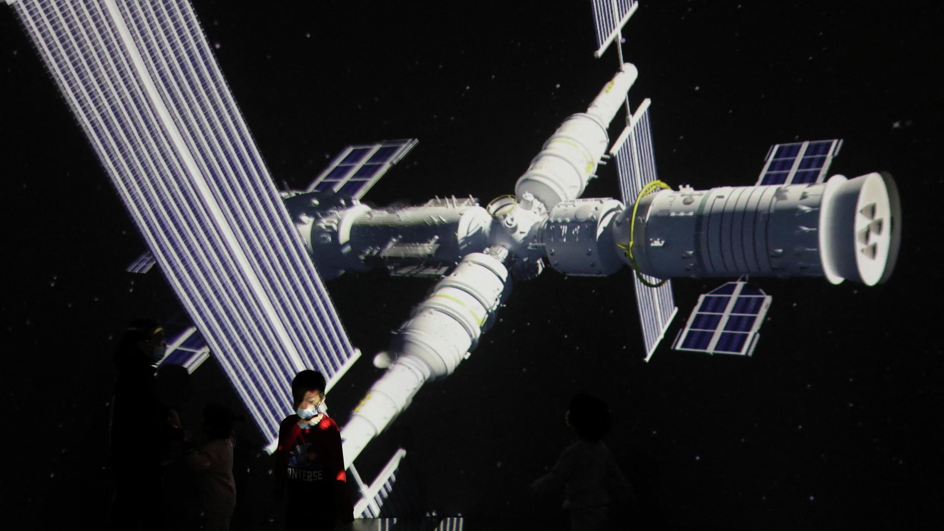 A child stands near a giant screen showing the image of the Tianhe space station on the country's Space Day at China Science and Technology Museum in Beijing, China April 24, 2021 A child stands near a giant screen showing the image of the Tianhe space station on the country's Space Day at China Science and Technology Museum in Beijing, China April 24, 2021 - Sputnik International, 1920, 28.12.2021