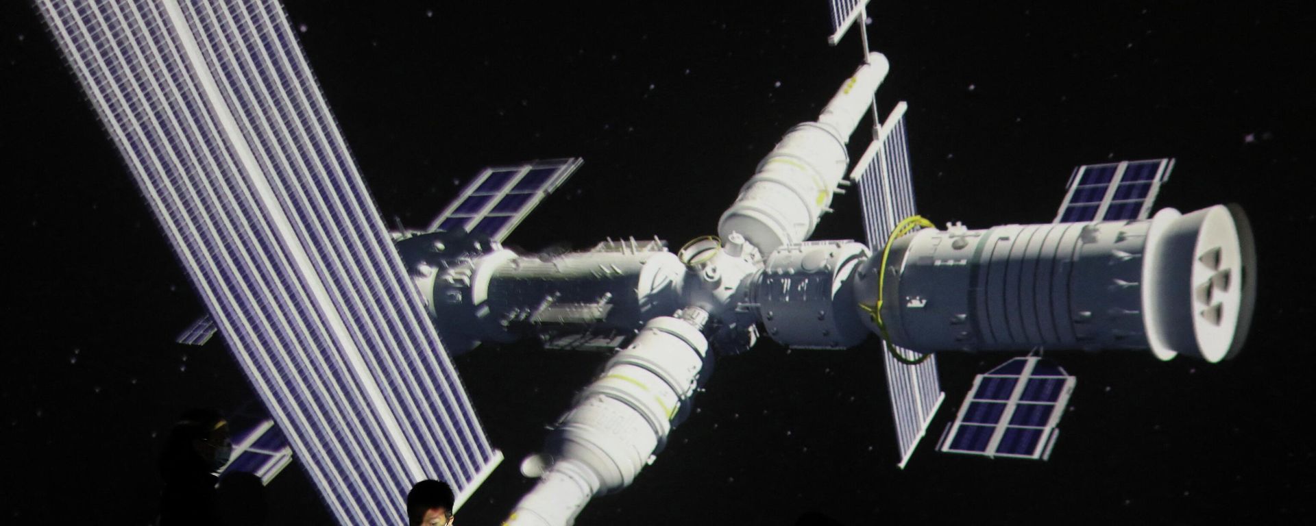 A child stands near a giant screen showing the image of the Tianhe space station on the country's Space Day at China Science and Technology Museum in Beijing, China April 24, 2021 A child stands near a giant screen showing the image of the Tianhe space station on the country's Space Day at China Science and Technology Museum in Beijing, China April 24, 2021 - Sputnik International, 1920, 27.12.2021