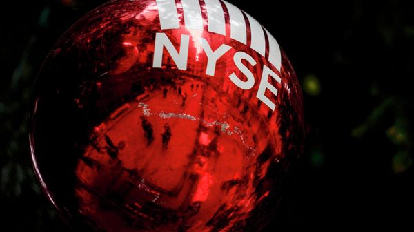 An oversized ornament is hung from a giant Christmas tree erected outside the New York Stock Exchange, Tuesday, Nov. 30, 2021, in New York. - Sputnik International