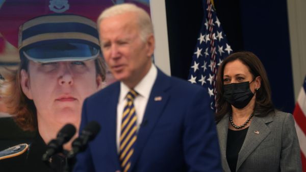 U.S. Vice President Kamala Harris listens as U.S. President Joe Biden gives remarks before signing four bills from the South Court Auditorium at the White House in Washington, U.S., November 30, 2021.  - Sputnik International