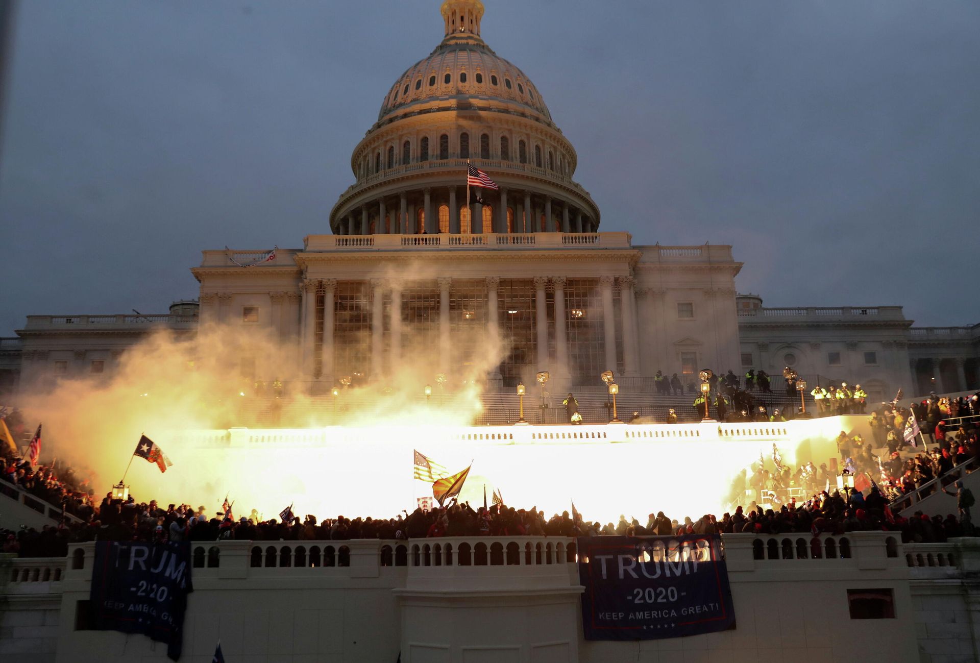 An explosion caused by a police munition is seen while supporters of U.S. President Donald Trump riot in front of the U.S. Capitol Building in Washington, U.S., January 6, 2021. An explosion caused by a police munition is seen while supporters of U.S. President Donald Trump riot in front of the U.S. Capitol Building in Washington, U.S., January 6, 2021. - Sputnik International, 1920, 06.01.2022