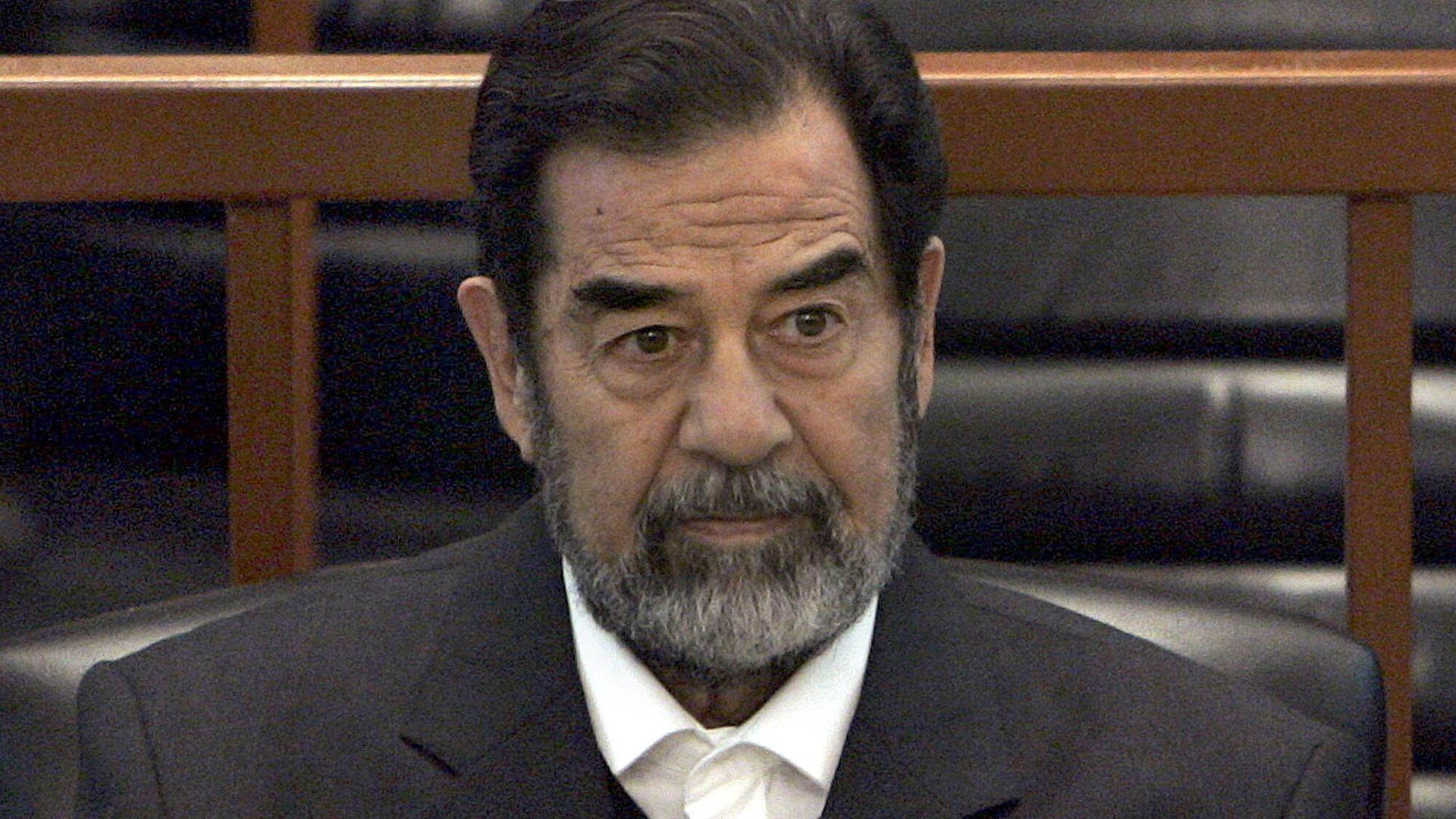 In this Dec. 6, 2006 file photo, former Iraq leader Saddam Hussein sits in court in Baghdad, Iraq, during the Anfal trial against him In this Dec. 6, 2006 file photo, former Iraq leader Saddam Hussein sits in court in Baghdad, Iraq, during the Anfal trial against him - Sputnik International, 1920, 29.12.2021