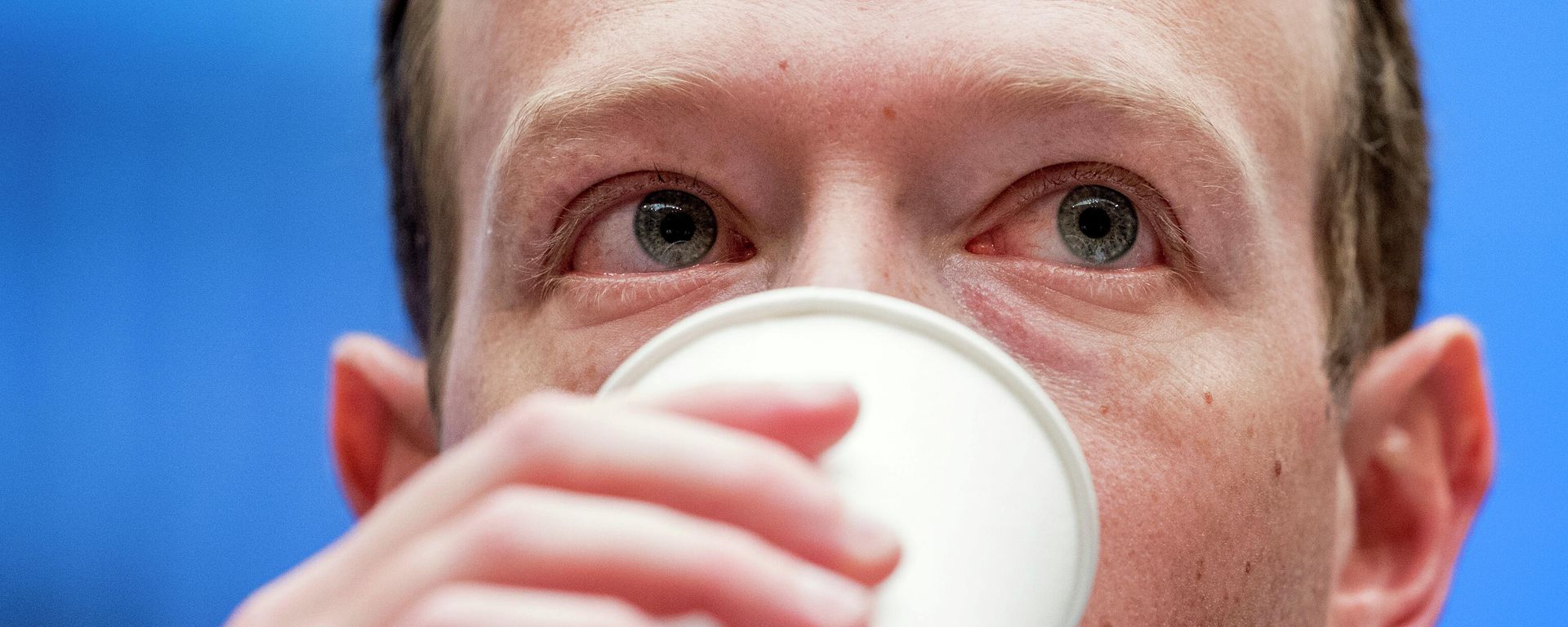 In this April 11, 2018, file photo, Facebook CEO Mark Zuckerberg takes a drink of water as he testifies before a House Energy and Commerce hearing on Capitol Hill in Washington.  - Sputnik International, 1920, 29.12.2021