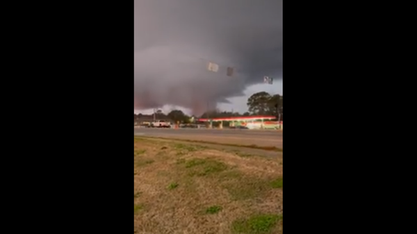Screenshot captures moment on December 31, 2021, that a tornado tore through several parts of the US state of Georiga and left destruction in its path. - Sputnik International