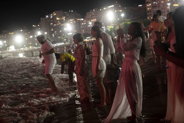 Revellers ring in the New Year as they watch fireworks explode over Copacabana Beach in Rio de Janeiro, Brazil, Saturday, 1 January 2022. - Sputnik International