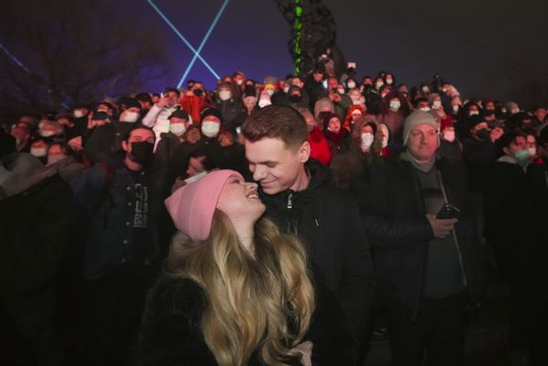 A couple attends a concert during New Year's celebrations in Bucharest, Romania, on 31 December 2021.  - Sputnik International