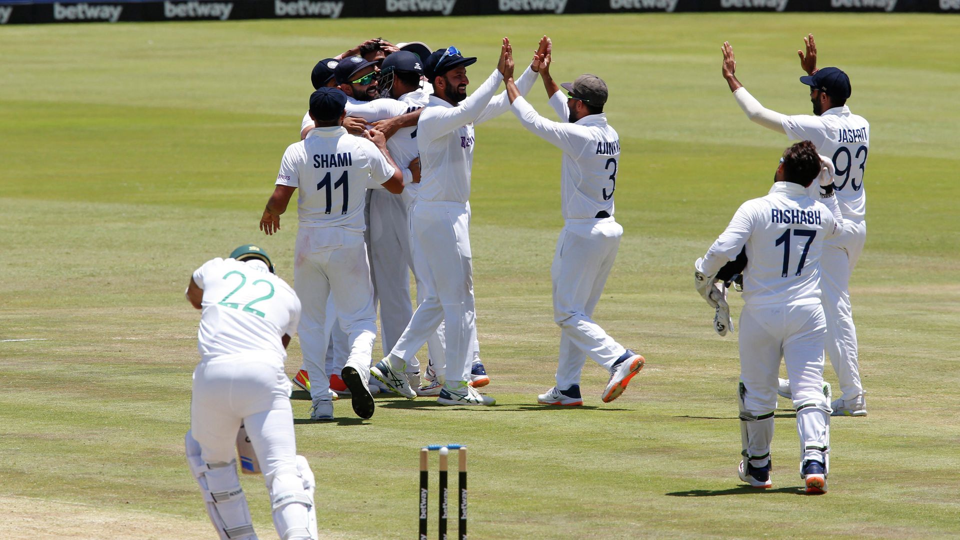 Cricket - First Test - South Africa v India - SuperSport Park Cricket Stadium, Pretoria, South Africa - December 30, 2021 India players celebrate taking the wicket of South Africa's Lungi Ngidi and winning the match REUTERS/Rogan Ward Cricket - First Test - South Africa v India - SuperSport Park Cricket Stadium, Pretoria, South Africa - December 30, 2021 India players celebrate taking the wicket of South Africa's Lungi Ngidi and winning the match REUTERS/Rogan Ward - Sputnik International, 1920, 01.01.2022