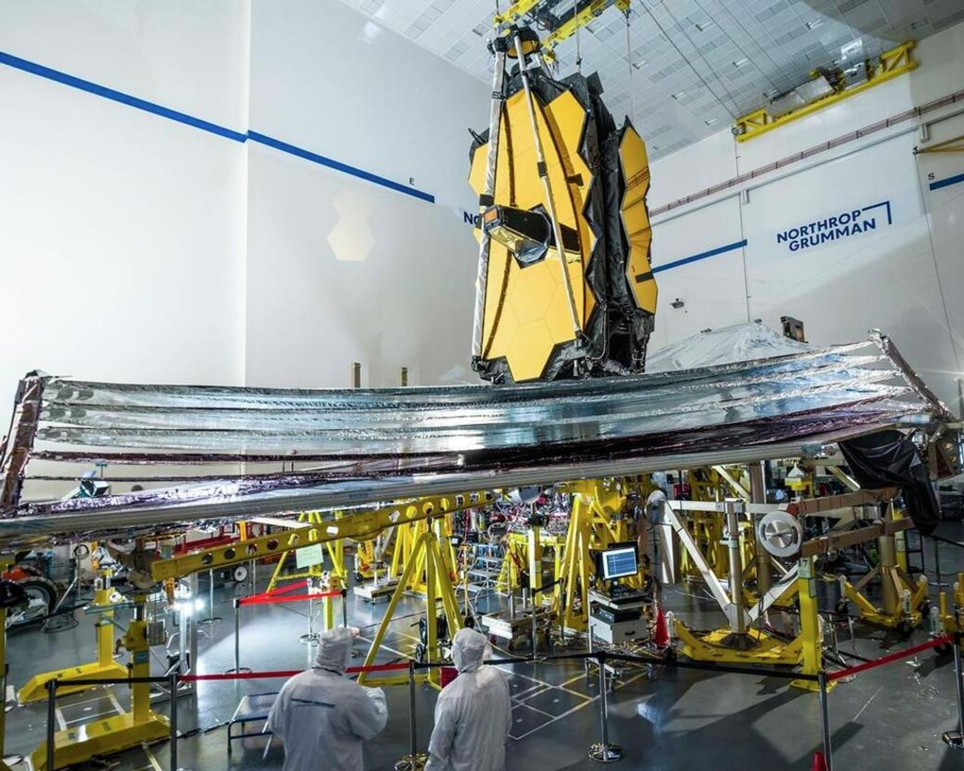 On Jan. 4, 2022, engineers successfully completed the deployment of the James Webb Space Telescope’s sunshield, seen here during its final deployment test on Earth in December 2020 at Northrop Grumman in Redondo Beach, California. The five-layer, tennis court-sized sunshield is essential for protecting the telescope from heat, allowing Webb’s instruments to cool down to the extremely low temperatures necessary to carry out its science goals. On Jan. 4, 2022, engineers successfully completed the deployment of the James Webb Space Telescope’s sunshield, seen here during its final deployment test on Earth in December 2020 at Northrop Grumman in Redondo Beach, California. The five-layer, tennis court-sized sunshield is essential for protecting the telescope from heat, allowing Webb’s instruments to cool down to the extremely low temperatures necessary to carry out its science goals. - Sputnik International, 1920, 05.01.2022
