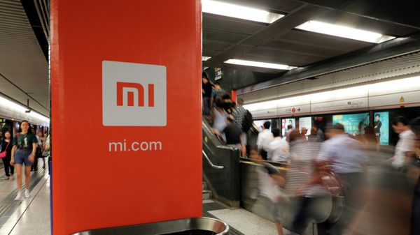 An advertisement for Xiaomi is displayed at a subway station in Hong Kong - Sputnik International