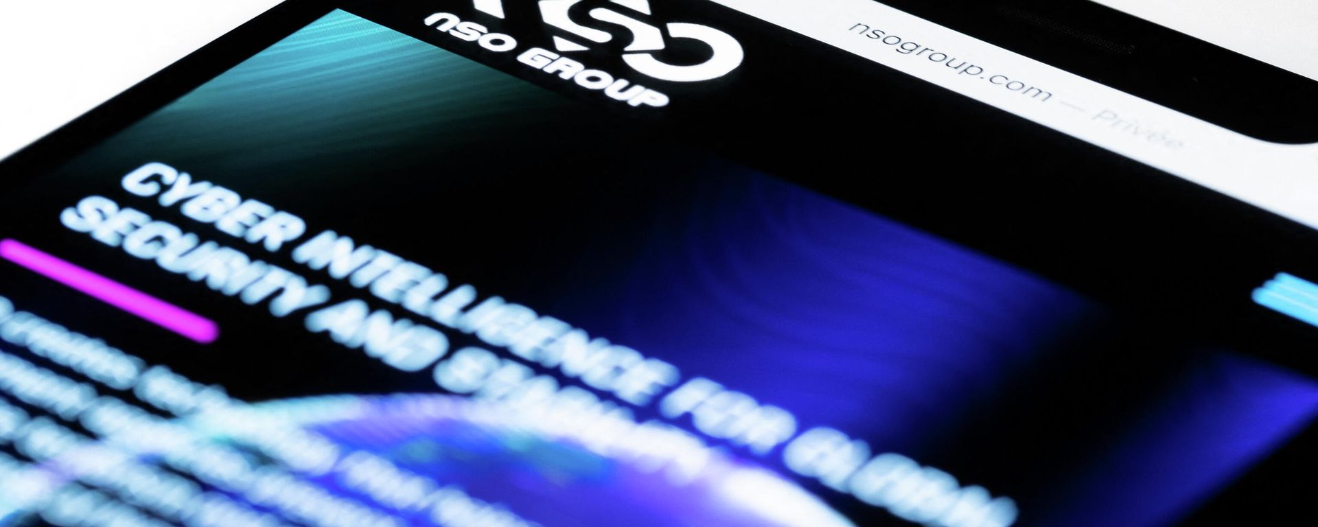 This studio photographic illustration shows a smartphone with the website of Israel's NSO Group which features 'Pegasus' spyware, on display in Paris on July 21, 2021. - Private Israeli firm NSO Group has denied media reports its Pegasus software is linked to the mass surveillance of journalists and rights defenders, and insisted that all sales of its technology are approved by Israel's defence ministry (Photo by JOEL SAGET / AFP) This studio photographic illustration shows a smartphone with the website of Israel's NSO Group which features 'Pegasus' spyware, on display in Paris on July 21, 2021. - Private Israeli firm NSO Group has denied media reports its Pegasus software is linked to the mass surveillance of journalists and rights defenders, and insisted that all sales of its technology are approved by Israel's defence ministry (Photo by JOEL SAGET / AFP) - Sputnik International, 1920, 07.01.2022