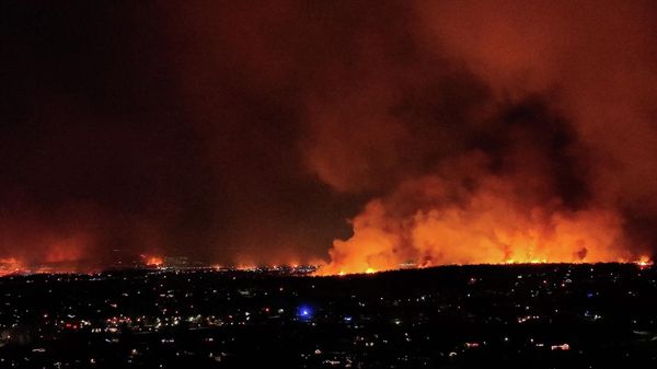 A general view shows wind-driven grass fires burning in Superior, Colorado, U.S., December 30, 2021 in this screen grab taken from drone footage obtained from social media. - Sputnik International