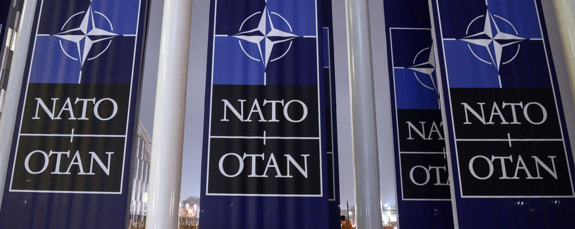 NATO banners in front of the organization's headquarters in Brussels - Sputnik International, 1920, 18.03.2026