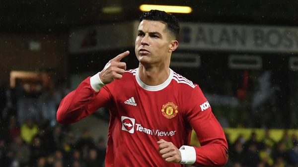 Manchester United's Portuguese striker Cristiano Ronaldo celebrates after scoring the opening goal from the penalty spot during the English Premier League football match between Norwich City and Manchester United at Carrow Road Stadium in Norwich, eastern England, on December 11, 2021 Manchester United's Portuguese striker Cristiano Ronaldo celebrates after scoring the opening goal from the penalty spot during the English Premier League football match between Norwich City and Manchester United at Carrow Road Stadium in Norwich, eastern England, on December 11, 2021 - Sputnik International
