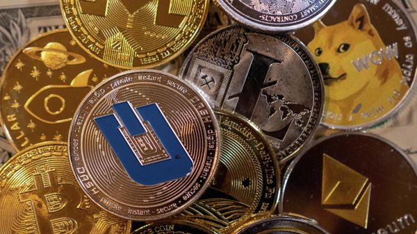 Representations of virtual cryptocurrencies are seen in this illustration taken November 28, 2021. REUTERS/Dado Ruvic/Illustration/File Photo - Sputnik International