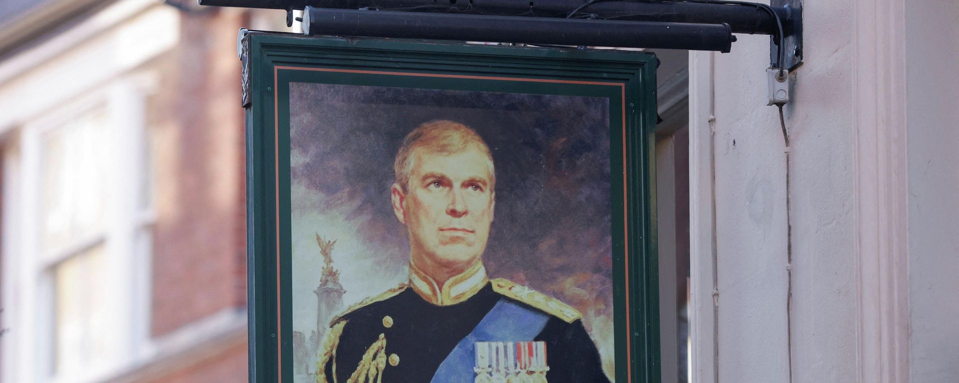 A portrait of Britain's Prince Andrew is seen on a sign outside the Duke of York public house in London A portrait of Britain's Prince Andrew is seen on a sign outside the Duke of York public house in London - Sputnik International, 1920, 19.01.2022