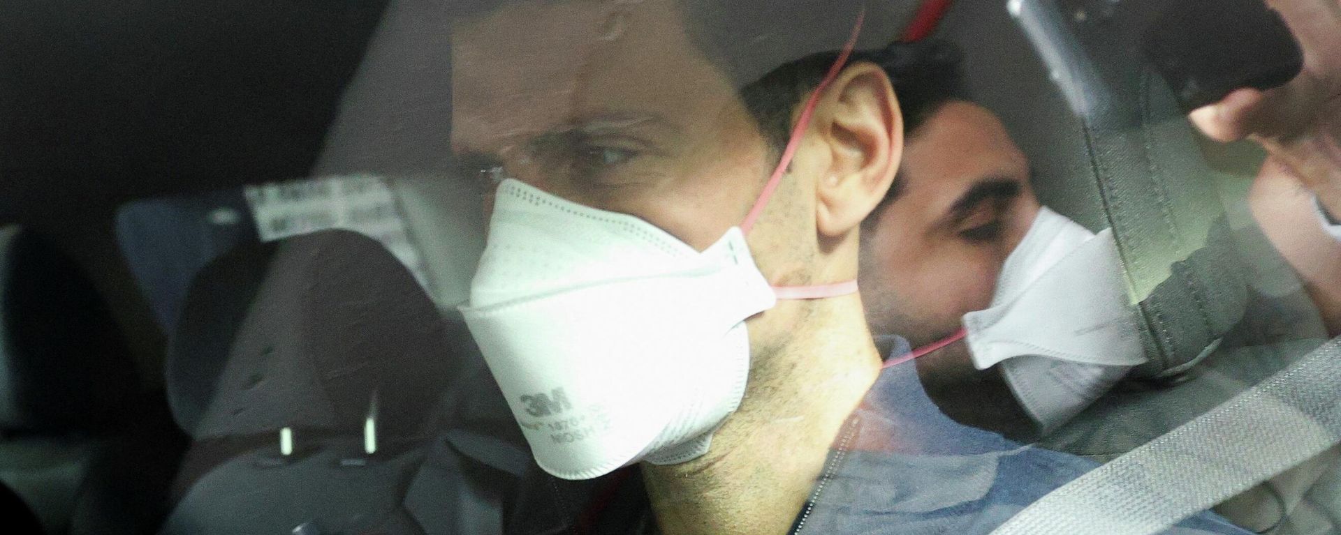 Serbian tennis player Novak Djokovic departs the Park Hotel while under immigration detention, to convene with his legal team after his visa to play in the Australian Open was cancelled a second time, in Melbourne, Australia, January 16, 2022. Serbian tennis player Novak Djokovic departs the Park Hotel while under immigration detention, to convene with his legal team after his visa to play in the Australian Open was cancelled a second time, in Melbourne, Australia, January 16, 2022. - Sputnik International, 1920, 20.01.2022