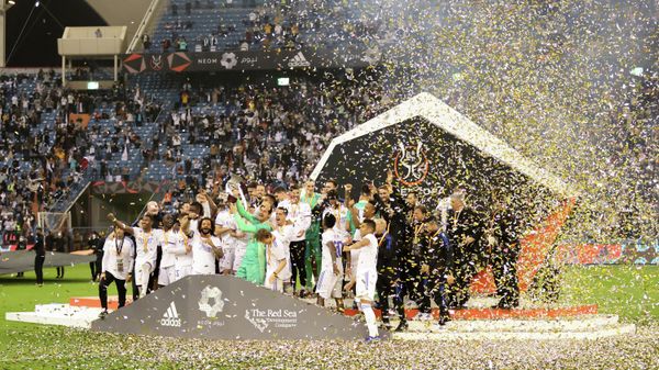 Real Madrid players celebrate with the trophy after winning the Spanish Super Cup Real Madrid players celebrate with the trophy after winning the Spanish Super Cup - Sputnik International