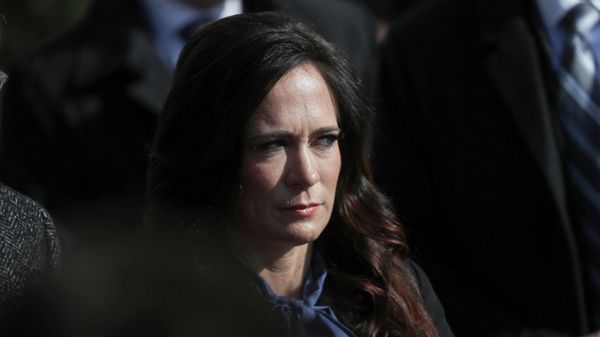 White House Press Secretary Stephanie Grisham listens to U.S. President Donald Trump talk to reporters as he departs for travel to Georgia from the South Lawn of the White House in Washington, U.S., November 8, 2019 - Sputnik International