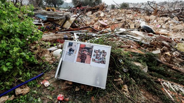 FILE PHOTO: Family photos are seen on the remains of a refrigerator at the site of a demolished house in the Sheikh Jarrah neighbourhood of East Jerusalem January 19, 2022. - Sputnik International