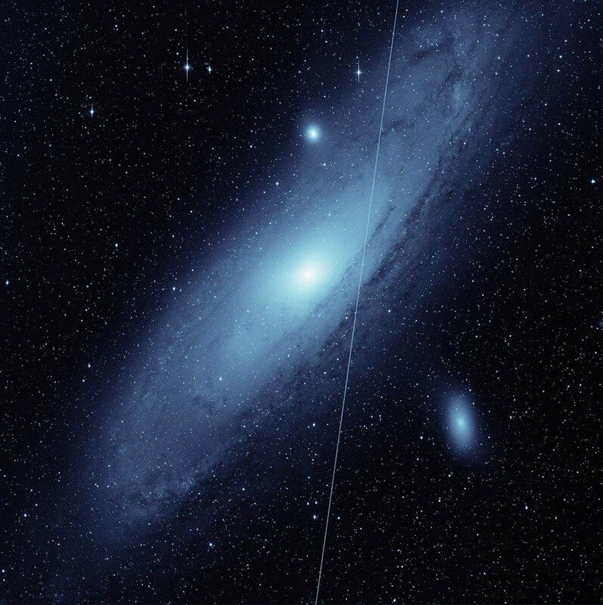 The streak from a Starlink satellite appears in this image of the Andromeda galaxy, taken by the Zwicky Transient Facility, or ZTF, during twilight on May 19, 2021. The image shows only one-sixteenth of ZTF's full field of view.
The streak from a Starlink satellite appears in this image of the Andromeda galaxy, taken by the Zwicky Transient Facility, or ZTF, during twilight on May 19, 2021. The image shows only one-sixteenth of ZTF's full field of view.
- Sputnik International, 1920, 21.01.2022