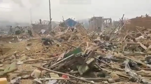 Screenshot captures aftermath of explosion in Ghana that occurred after a vehicle collided with a motorcycle. The vehicle had been carrying explosives. - Sputnik International