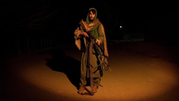 A Taliban fighter poses for a photo at a check point in Herat Afghanistan, on Monday, Nov. 29, 2021 - Sputnik International