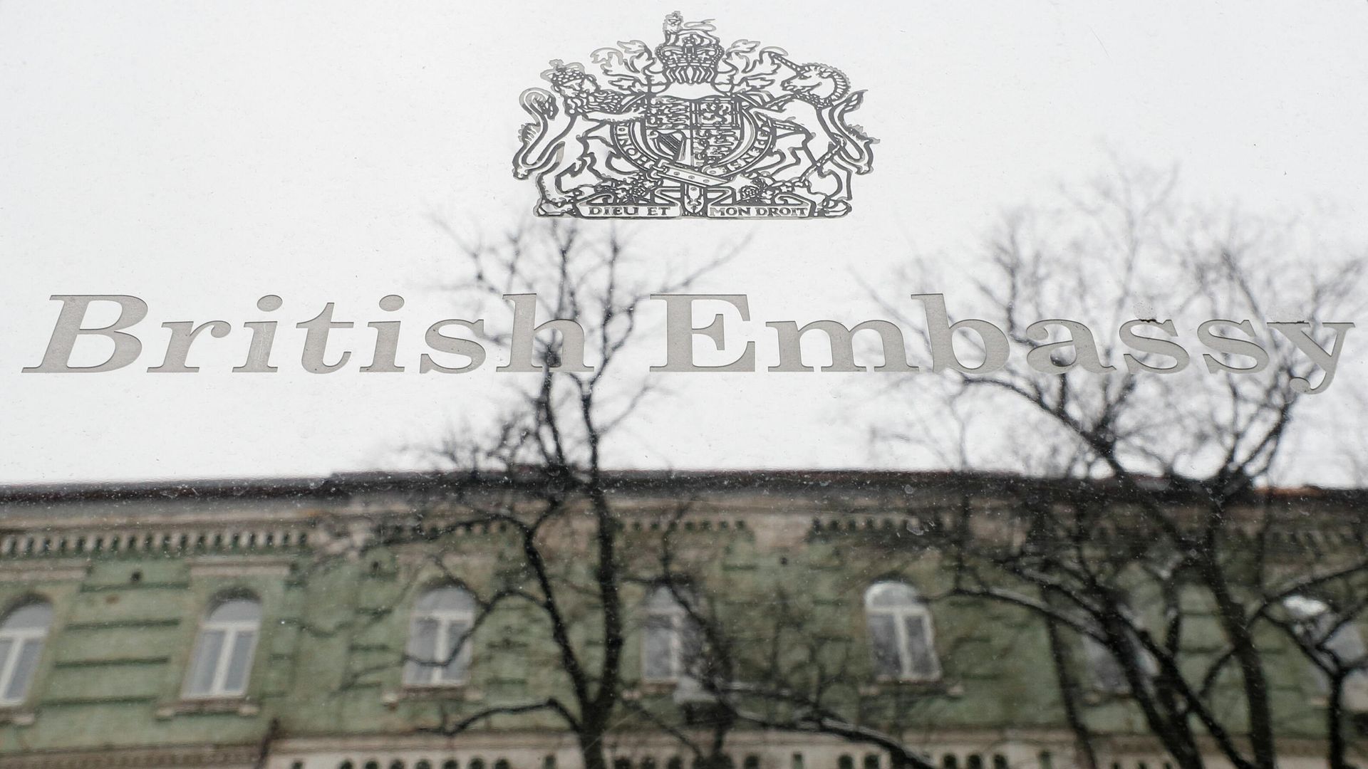 A building, which is located on the opposite side of a street, is reflected in a sign hanging on the facade of the British Embassy in Kyiv, Ukraine January 24, 2022. The British Embassy in Ukraine said some staff and dependants were being withdrawn from Kyiv amid tensions between Russia and the West over Ukraine. REUTERS/Gleb Garanich A building, which is located on the opposite side of a street, is reflected in a sign hanging on the facade of the British Embassy in Kyiv, Ukraine January 24, 2022. The British Embassy in Ukraine said some staff and dependants were being withdrawn from Kyiv amid tensions between Russia and the West over Ukraine. REUTERS/Gleb Garanich - Sputnik International, 1920, 10.02.2022