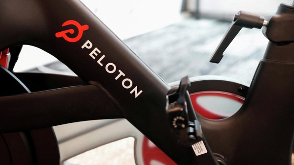 A Peloton exercise bike is seen after the ringing of the opening bell for the company's IPO at the Nasdaq Market site in New York City, New York, U.S., September 26, 2019. REUTERS/Shannon Stapleton/File Photo - Sputnik International