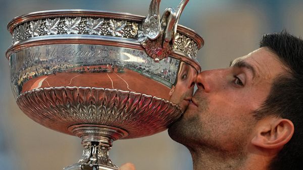 FILE - Serbia's Novak Djokovic kisses the cup after defeating Stefanos Tsitsipas of Greece during their final match of the French Open tennis tournament at the Roland Garros stadium Sunday, June 13, 2021 in Paris FILE - Serbia's Novak Djokovic kisses the cup after defeating Stefanos Tsitsipas of Greece during their final match of the French Open tennis tournament at the Roland Garros stadium Sunday, June 13, 2021 in Paris - Sputnik International