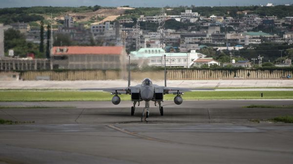 In this June 29, 2017 photo made available by the U.S. Air Force, an F-15 fighter plane taxis back to the hangar at Kadena Air Base, Japan.  - Sputnik International