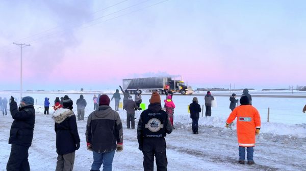 Family, friends and neighbours gather to show support for the freedom convoy on the Trans-Canada highway in Grenfell, Saskatchewan, Canada January 25, 2022 in this screenshot obtained from a video on social media - Sputnik International