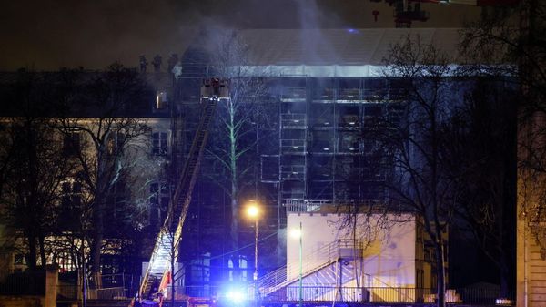 Firefighters work at the scene where a fire broke out at a building undergoing renovation near Hotel Beauharnais, German ambassador's residence, and Musee d'Orsay in Paris - Sputnik International