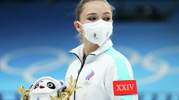 Kamila Valieva of the Russian Olympic Committee after winning gold during the flower ceremony. 7 February 2022. - Sputnik International
