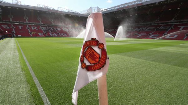 A corner flag with the logo of the Manchester United soccer team on it as the pitch is warted ahead of the English Premier League soccer match between Manchester United and Leicester City at Old Trafford, in Manchester, England, Friday, Aug. 10, 2018 - Sputnik International