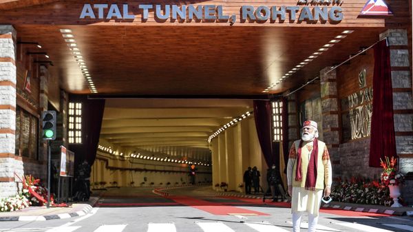 In this handout photograph taken on October 3, 2020 and released by the Indian Press Information Bureau (PIB), India's Prime Minister Narendra Modi poses at the entrance of the Highway Atal tunnel, near Manali in Himachal Pradesh state - Sputnik International