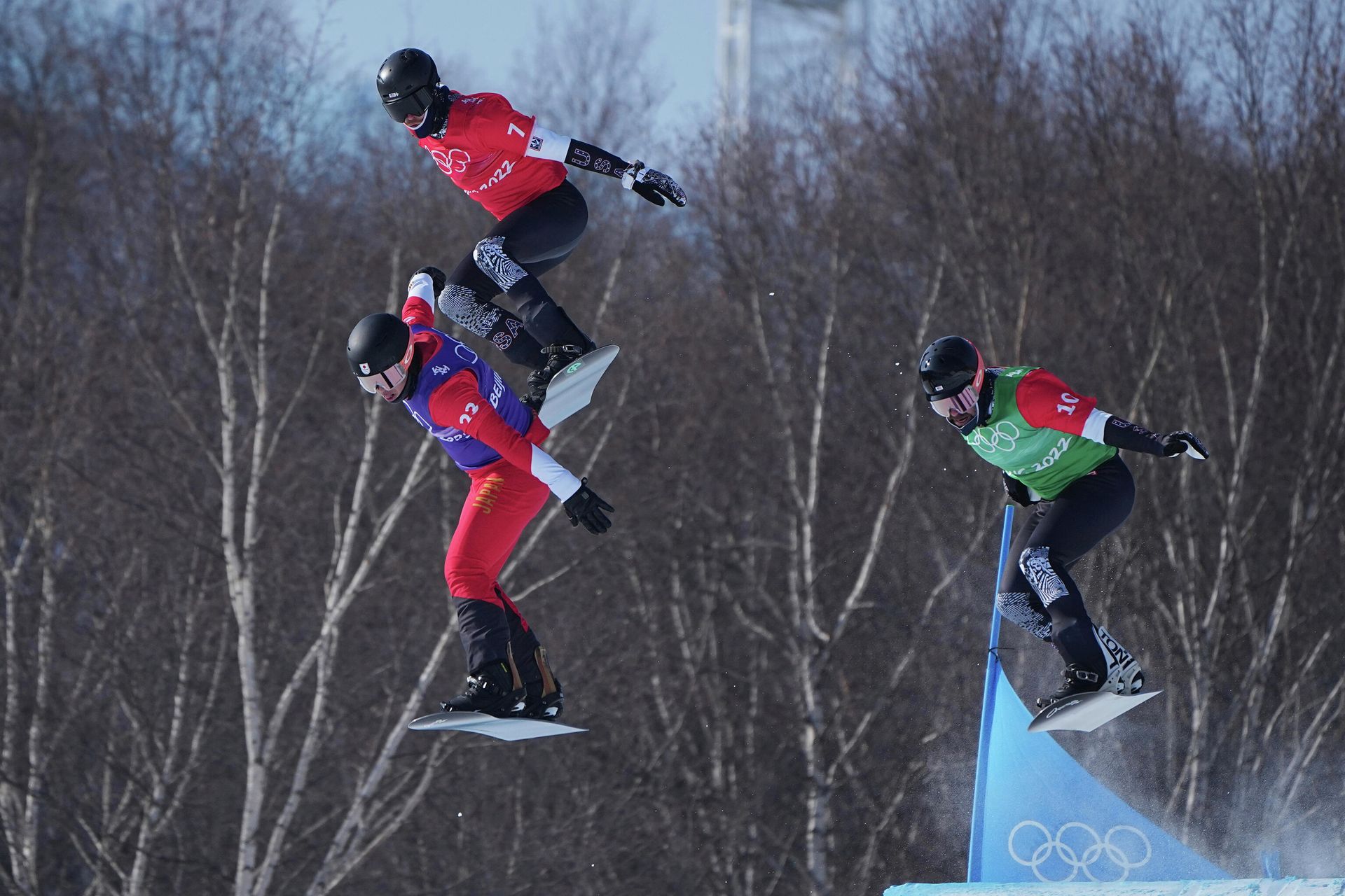 Japan's Yoshiki Takahara (23), United States' Hagen Kearney (7) and United States' Nick Baumgartner (10) run the course during the men's cross finals at the 2022 Winter Olympics, Thursday, Feb. 10, 2022, in Zhangjiakou, China. Japan's Yoshiki Takahara (23), United States' Hagen Kearney (7) and United States' Nick Baumgartner (10) run the course during the men's cross finals at the 2022 Winter Olympics, Thursday, Feb. 10, 2022, in Zhangjiakou, China. - Sputnik International, 1920, 12.02.2022