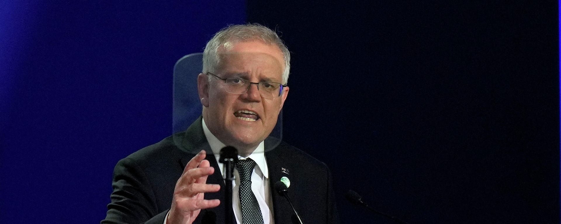 Australia's Prime Minister Scott Morrison gestures as he makes a statement at the UN Climate Change Conference (COP26) in Glasgow, Scotland, Britain November 1, 2021 Australia's Prime Minister Scott Morrison gestures as he makes a statement at the UN Climate Change Conference (COP26) in Glasgow, Scotland, Britain November 1, 2021 - Sputnik International, 1920, 15.02.2022