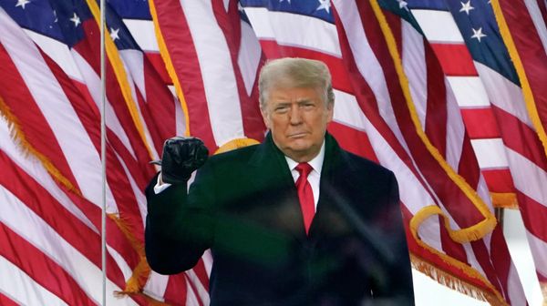 Then-President Donald Trump gestures as he arrives to speak at a rally in Washington, on Jan. 6, 2021 - Sputnik International