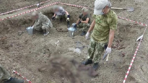 Mass burial of civilians - Sputnik International