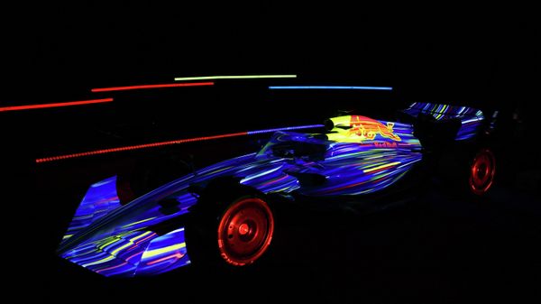 A handout photograph taken on January 28, 2022 and released on February 9, 2022 by Red Bull shows the new Red Bull Racing RB18 car during a launching event in Corby.  - Sputnik International