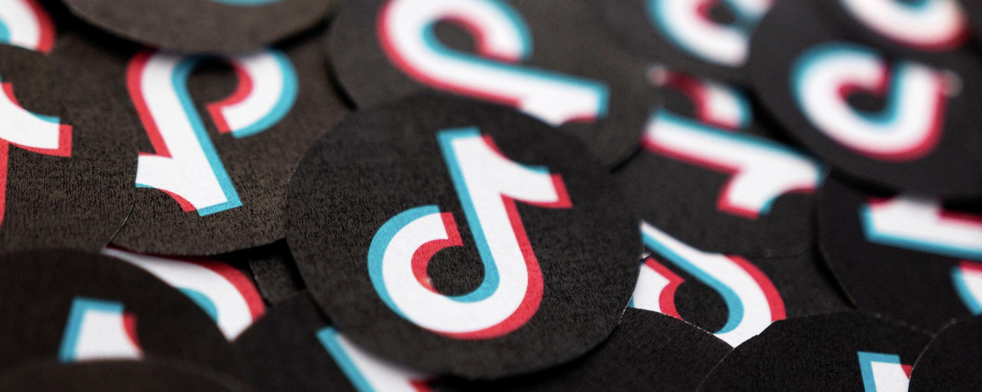 Printed TikTok logos are seen in this illustration taken February 15, 2022. Printed TikTok logos are seen in this illustration taken February 15, 2022. - Sputnik International, 1920, 19.02.2022