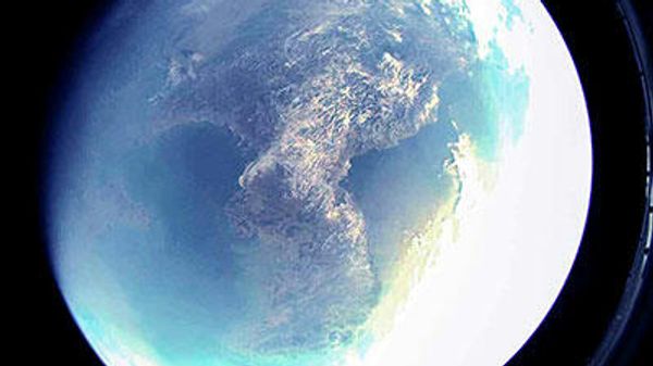 Image taken from camera aboard North Korean rocket conducting satellite test. - Sputnik International