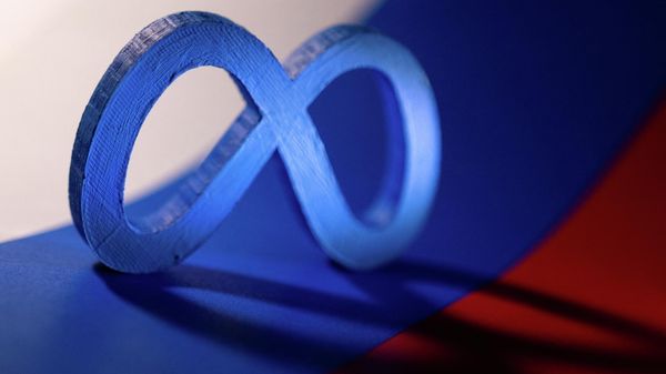Meta logo is placed on a Russian flag in this illustration taken February 26, 2022 - Sputnik International