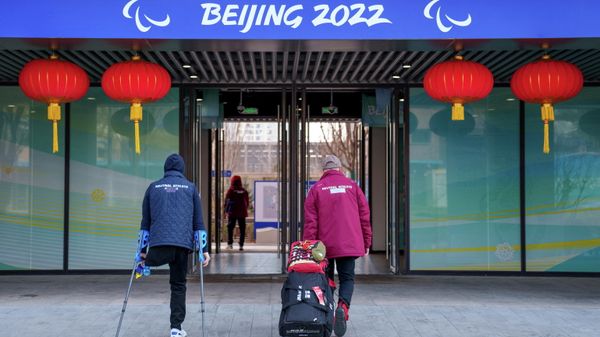 Beijing 2022 Winter Paralympic Games - Beijing 2022 Winter Paralympic Games Preview - National Indoor Stadium, Beijing, China - March 3, 2022. Neutral athletes of the team formerly known as the Russian Paralympic Committee arrive at the Paralympic Village with tape covering the word Russia on their clothing ahead of the Beijing 2022 Winter Paralympic Games  - Sputnik International