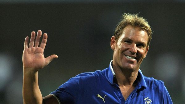 (FILES) In this file photograph taken on May 20, 2011, Australian bowling legend and Rajasthan Royals' captain Shane Warne waves to the crowd as he leaves the field after his last international match -  - Sputnik International